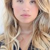 Evie Thompson as Tracy-The Rockin' Teen