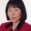 Kim Kim as Korean Wife