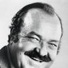 William Conrad as TV Newscaster (voice) (uncredited)