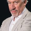 Simon Callow as Judge