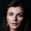 Aisling Bea as Rebecca