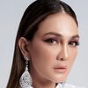 Luna Maya as Dr. Dian