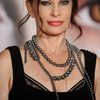 Jane Badler as Professor Banyon