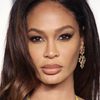 Joan Smalls as Suze