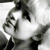 Louise Lawson as Blonde in Gold Pants