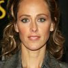 Kim Raver as Carol Danvers / Captain Marvel (voice)