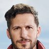 Andy Samberg as David E. Scherman