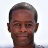 Adrian Lester as Captain Adam Spencer