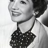Claudette Colbert as Eve Peabody