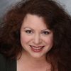Melynda Kiring as Mrs. Garrett