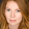 Ascia Maybury as Mrs. MacMenigall