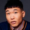 Joel Kim Booster as Phil
