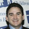 Valente Rodriguez as Father David
