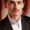 Timothée Chalamet as Marty Mauser