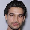 Steven Strait as Warren Peace
