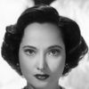 Merle Oberon as Karen Wright