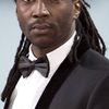 Noom Diawara as Charles Koffi