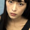 Miho Suzuki as International News Anchor