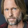 Rick Amsbury as Malcolm Dodds