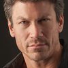 Paul Logan as Captain Brooks