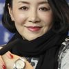 Nai An as Woman Who Delivers Cigarettes in the Hospital