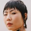 May Hong as Lesbian