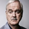 John Cleese as Fairy Godmother / Executioner (voice)