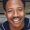 Chris Sandiford as Greg