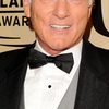 Joe Regalbuto as Father Doldana