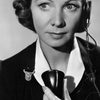 Queenie Leonard as Woman Singer