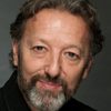 Ian Reddington as Francis the Bus Driver