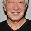Michael Yama as Curious Sushi Man