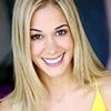 Lauren Compton as Sarah