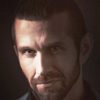 Eoin O'Brien as Ezra