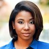 Nikia Reynolds as Reporter #2