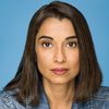 Melanie Kiran as Passport Worker