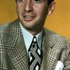 Macdonald Carey as Nicholas 'Nick' Carraway