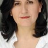 Siir Eloglu as Dr. Scholl