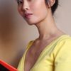 Carolina Hsu as Market Woman