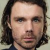 Matthew Needham as Junkie