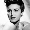 Nancy Kelly as Eve Kingsley
