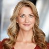 Maggie Rowe as Receptionist