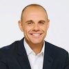 Jason Mohammad as Newsreader
