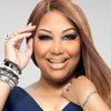 Traci Braxton as Minister Florence