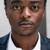 Marc Zinga as Koffi