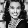 Loretta Young as Trina