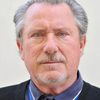Paul Mark Elliott as Theatre Manager