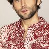 Jake Borelli as Freddie Myers