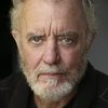 Bob McCracken as Pastor Barnes