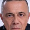 Nikolai Tsankov as Father Alex